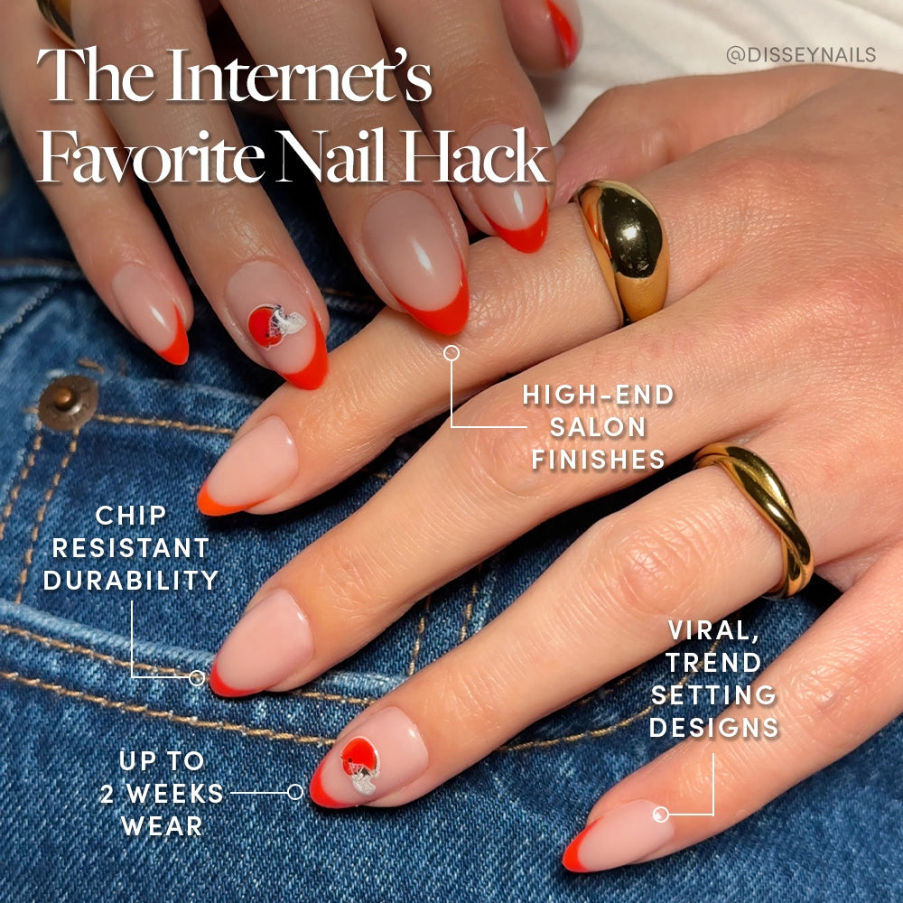 Close-up of hands with glamnetic Cleveland Browns Press-On Nail Set—glossy red and nude French tips, abstract designs, gold rings. Text highlights chip-resistant durability, up to 2 weeks wear, high-end finishes, trend-setting Browns styles. - Product image