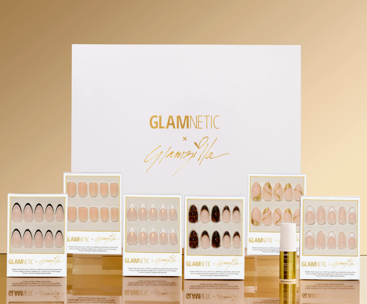 Glamnetic press-on nail set with packaging on a beige background