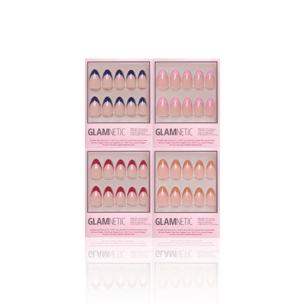 Four boxes of glamnetic Crème de la Chic press-on nails, pink packaging, each showing ten French Tip or Short Almond nude/pink/gradient designs—vegan & cruelty-free—in a 2x2 grid on a white background. - Product image