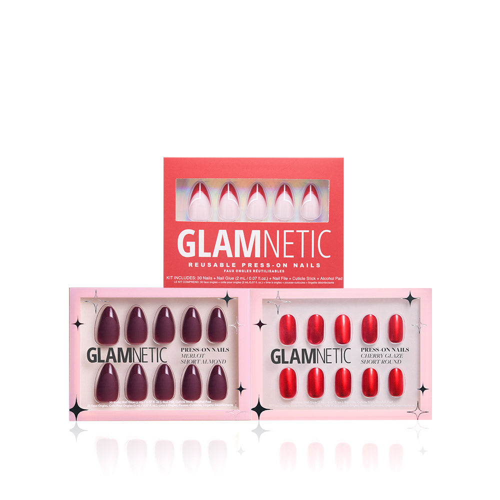 Three boxes of glamnetic Press On Nails are shown. The top box has pink nails, while the two bottom boxes display Crimson Charm and Cherry Glaze shades, all in pink packaging with clear windows. - Product image