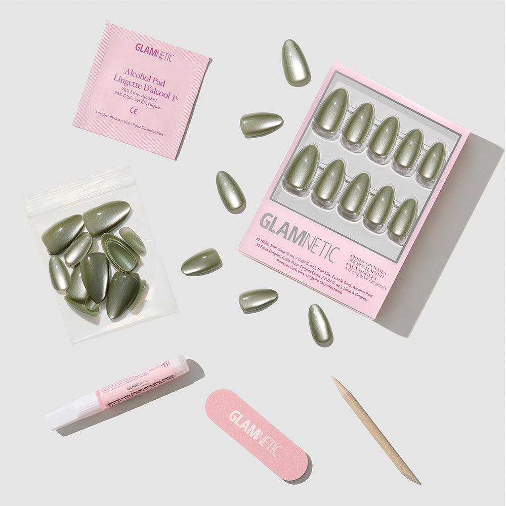 Glamnetic Dirty Martini press-on nails in a short almond shape with a velvet finish, including a box set, extra nails, an alcohol prep pad, nail glue, a nail file, and a wooden cuticle stick. - Product image