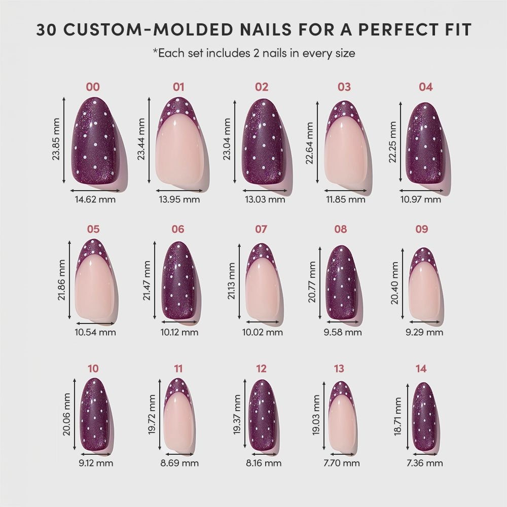 A chart displays the “Dotted Mulberry” press-on nail set by glamnetic, featuring 30 custom-molded nails in various sizes and shades. Each nail is labeled by number with its dimensions in millimeters, and the set includes playful polka-dot styles alongside elegant purple French tips. - Product image