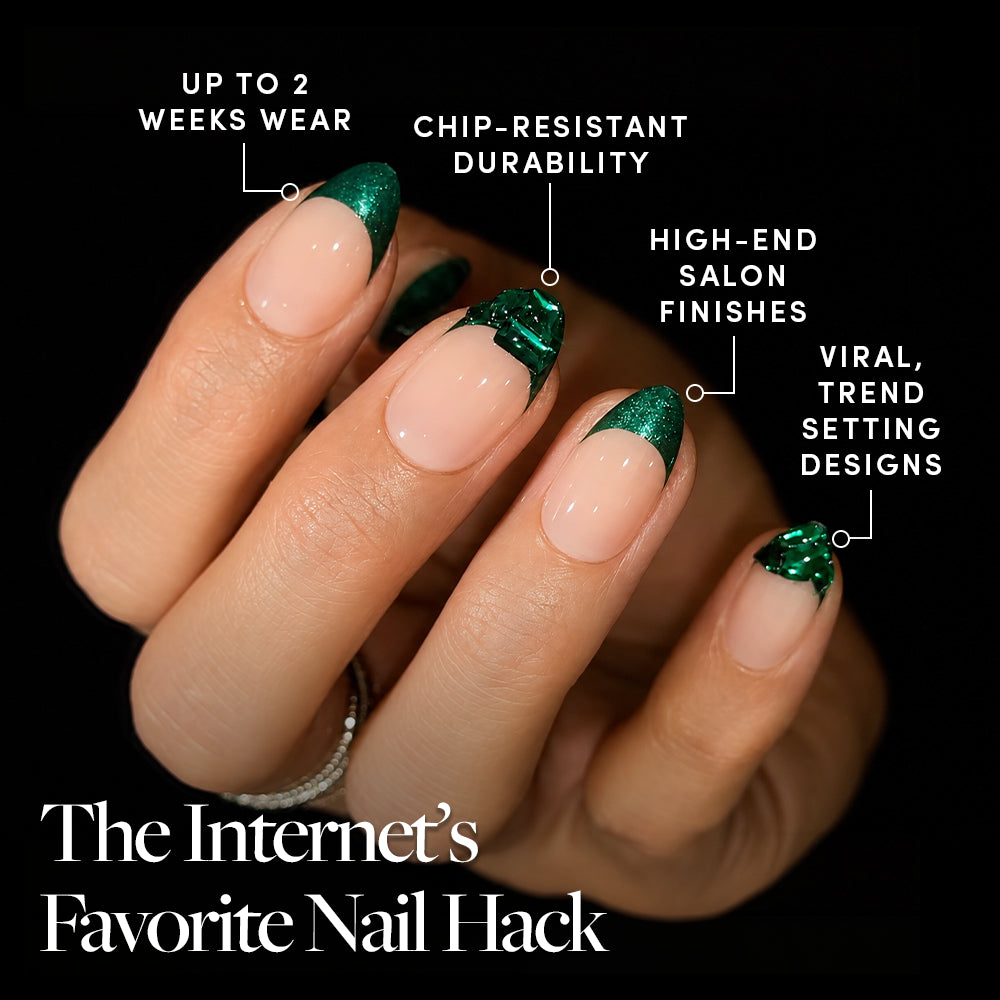 A hand with green glittery French tip nails showcases the elegance of Emerald by glamnetic. Text highlights features: up to 2 weeks wear, chip-resistant durability, salon-quality press-on nails for high-end finishes, and viral, trend-setting designs. The Internet’s Favorite Nail Hack is in bold text. - Product image