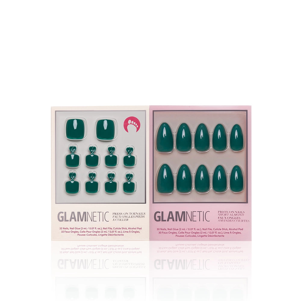 Two boxes of Glamnetic’s Emerald Green Mani & Pedi press-on nails are displayed: the left has square green nails with heart details, while the right features oval emerald green nails. Both offer a high-gloss, salon-quality manicure finish. - Product image