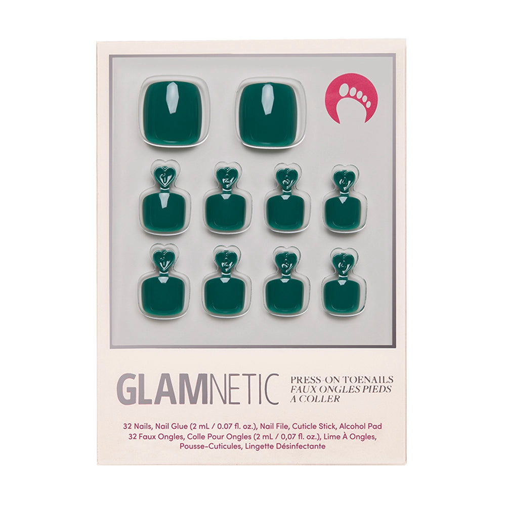A box of glamnetic Emerald Green Toenail includes 12 glossy, vegan, cruelty-free press-on toenails in multiple sizes, neatly arranged in rows with application tools listed on the packaging.