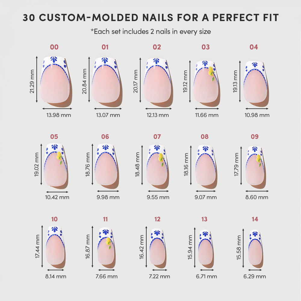 A chart displays 15 sizes of glamnetic’s Tuscan Twist custom-molded press-on nails, showcasing blue and yellow floral designs on medium coffin nails, each labeled with numbers and precise width and length measurements in millimeters. - Product image