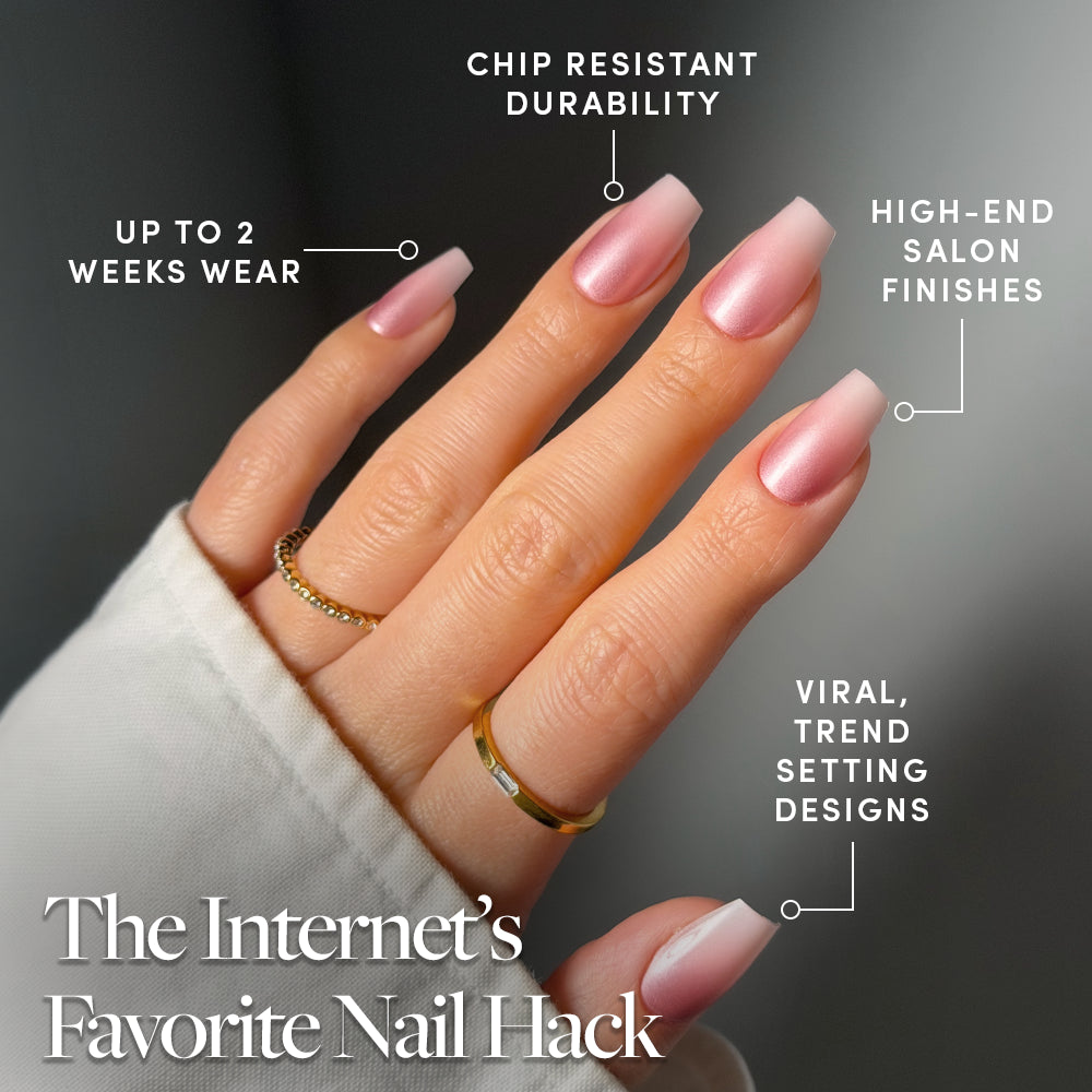 A hand with long, pink, glossy coffin press-on nails—glamnetic EVERYDAY BEAUTY QUEEN—wears three gold rings. Text highlights chip-resistant durability, salon-quality finish, trendy designs, and up to two weeks of wear. - Product image