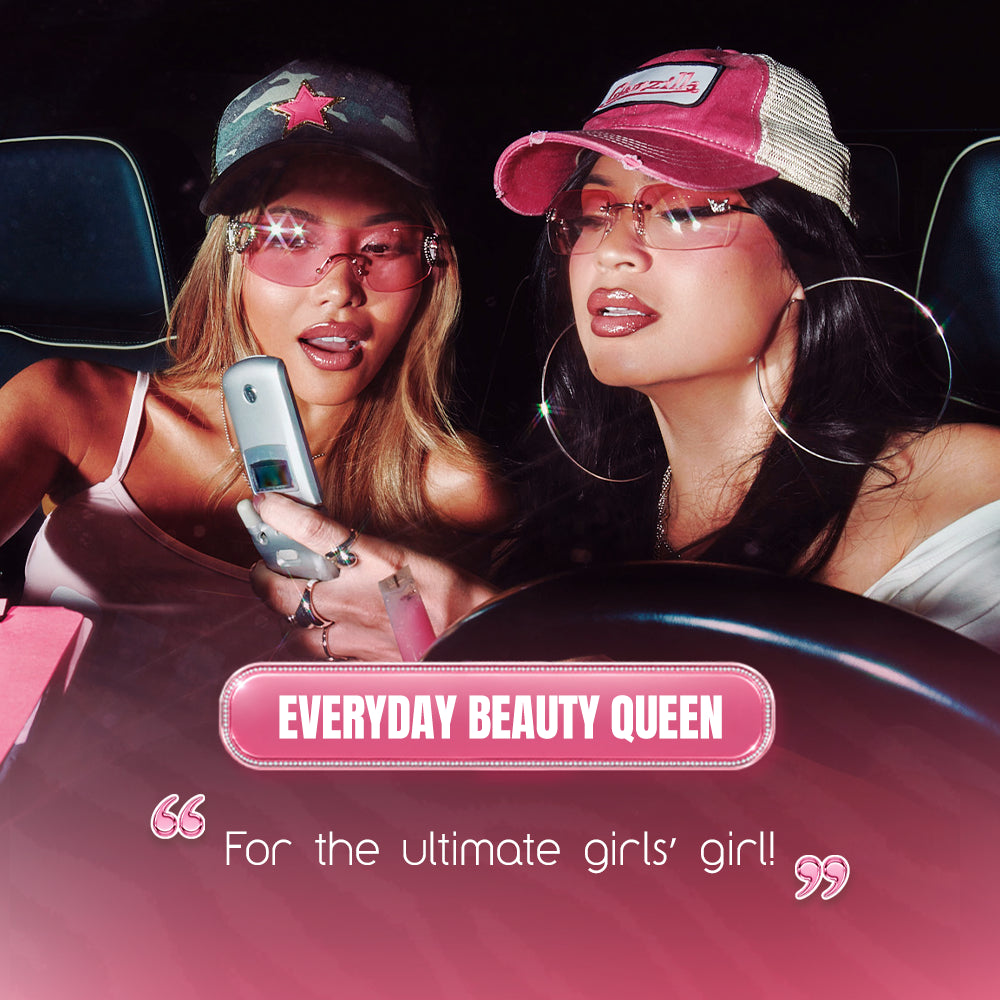 Two stylish women in pink hats and sunglasses sit in a car, one showing off glossy ombré nails and a flip phone. The text “EVERYDAY BEAUTY QUEEN” by glamnetic shines in a glamorous pink design, made for the ultimate girls’ girl!. - Product image