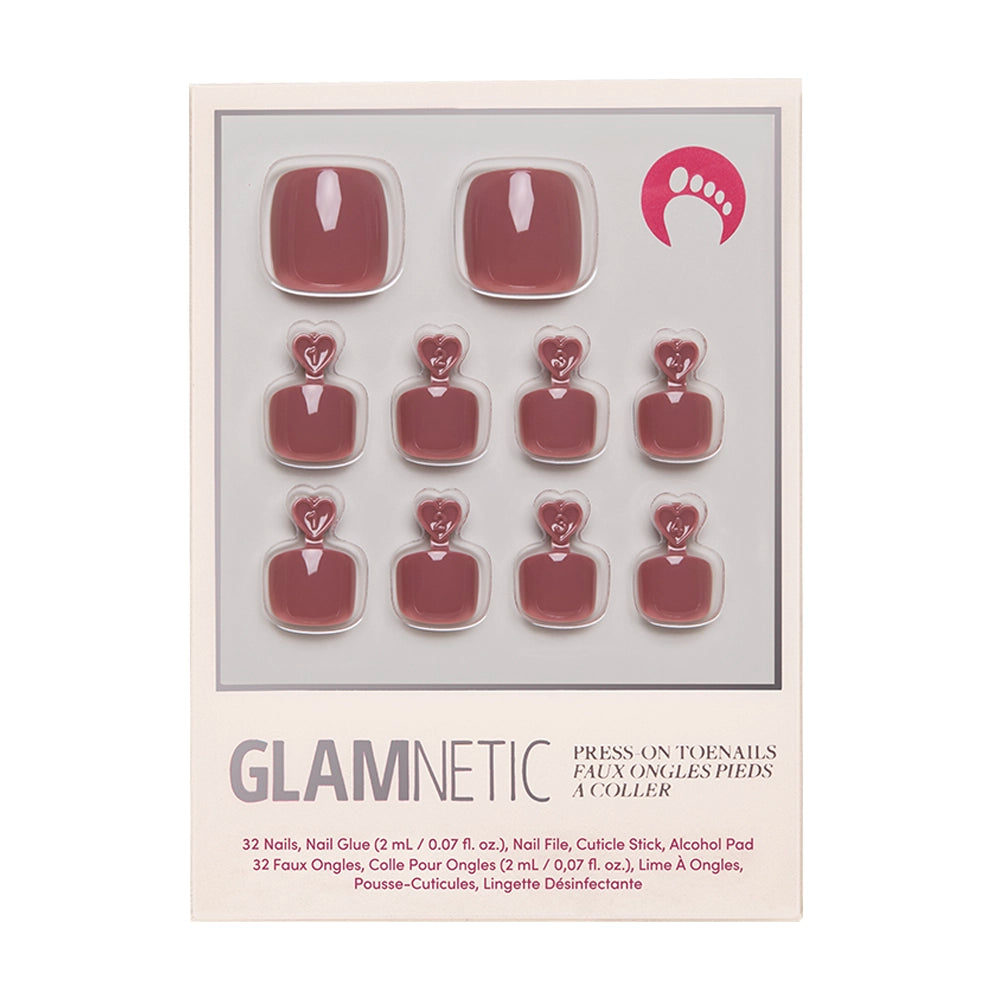 The glamnetic Fall Mauve Toenail set features 10 glossy, dusty rose vegan press-on toenails with nail glue and accessories, all visible in clear front packaging.
