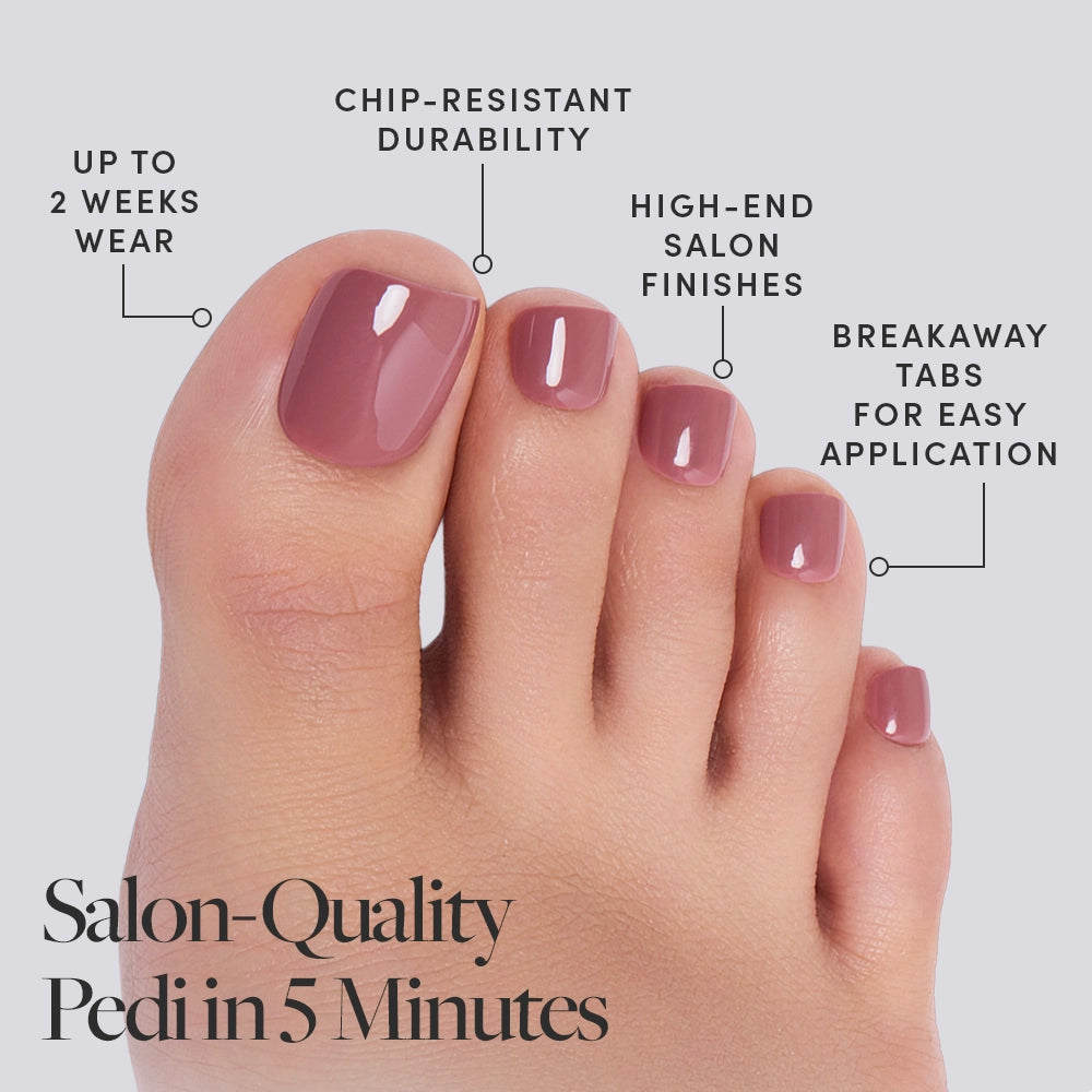 A close-up of a foot wearing glamnetic's Fall Mauve Toenail press-ons, featuring glossy, chip-resistant, vegan nails with breakaway tabs for easy application and a salon-quality finish that lasts up to two weeks—get a pedi in 5 minutes. - Product image
