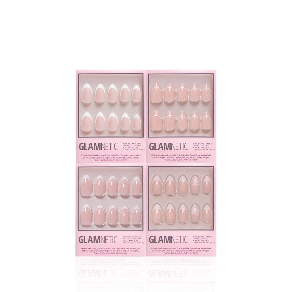 Four boxes of glamnetic’s Pardon My French Almonds salon-quality press-on nails are displayed. Each box features a distinct set of almond-shaped nails with assorted designs, including solid colors, patterns, and sophisticated French tips—all showcased in stylish pink packaging against a white background. - Product image