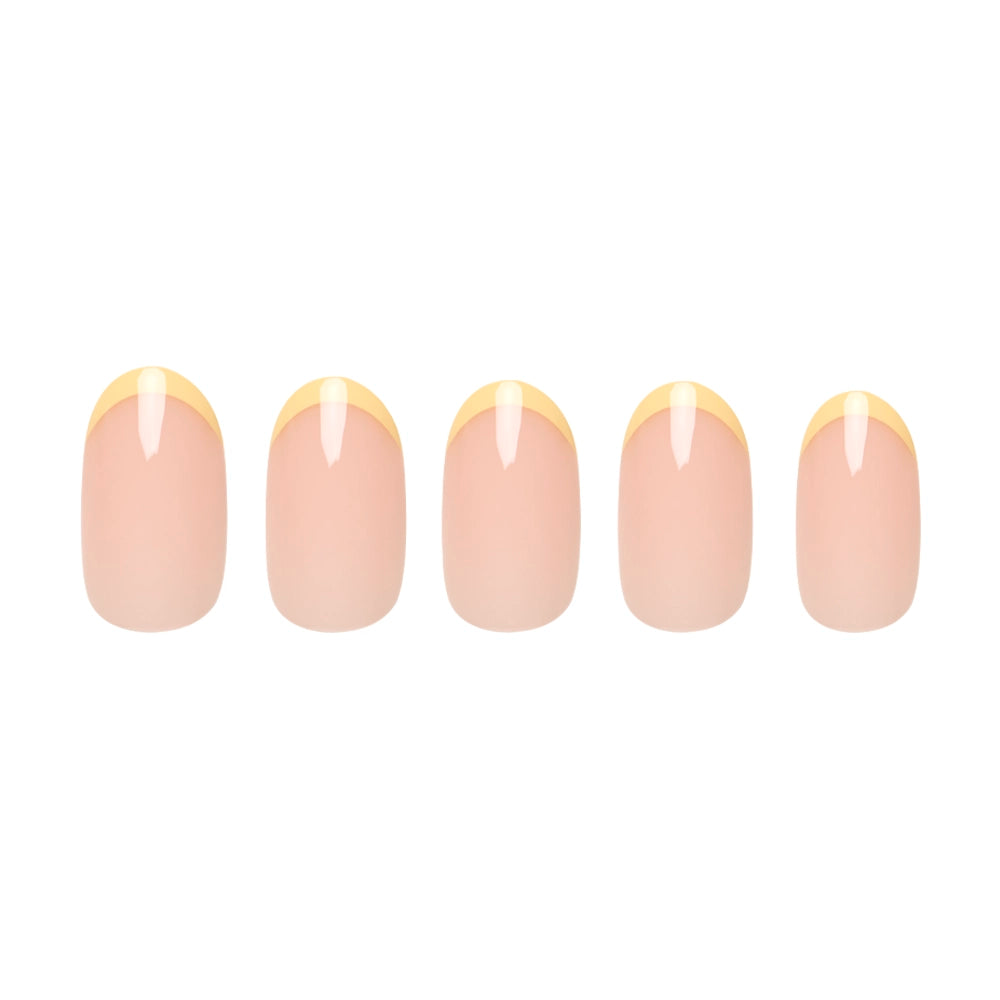 Five artificial nails from glamnetic’s French Butter set, featuring nude bases and pastel yellow French tips, are arranged in a row on a white background to highlight their elegance and salon-quality durability. - Product image