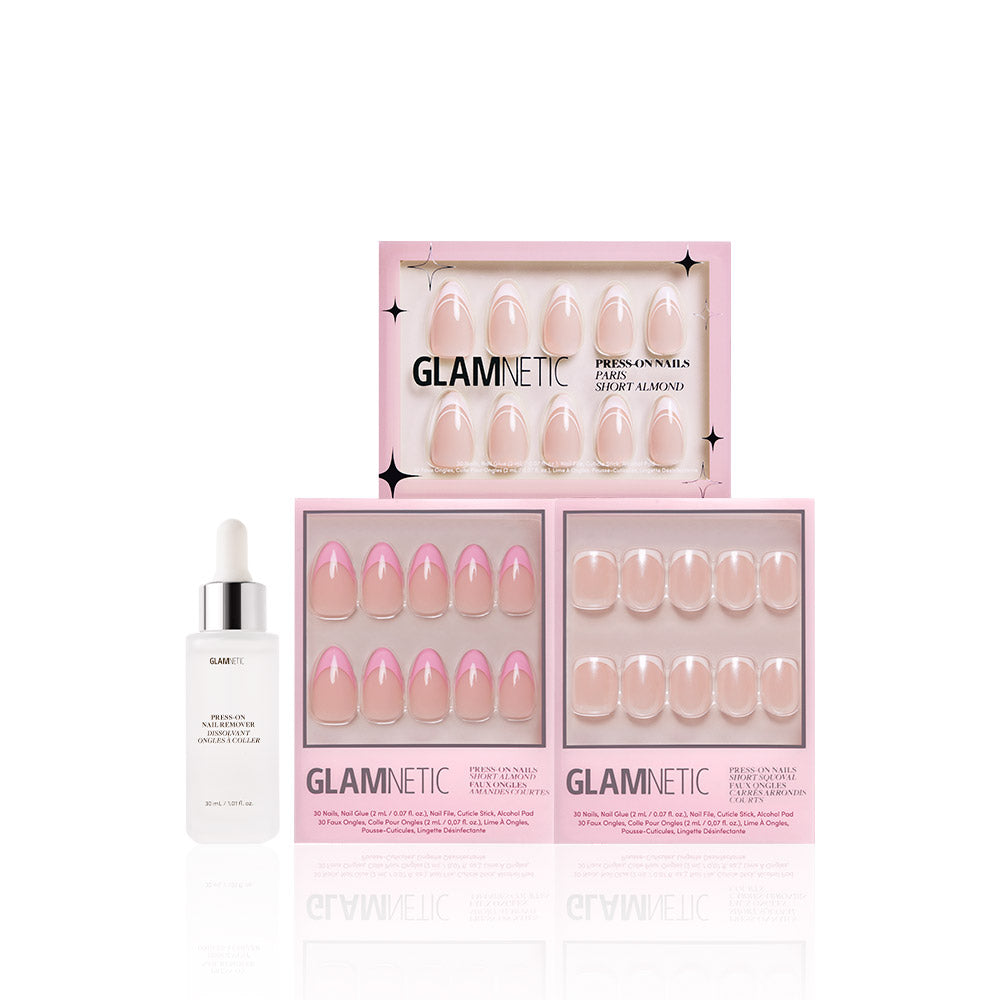 Three sets of glamnetic French Tip Faves press-on nails in pink and nude shades are displayed in pink boxes with a dropper bottle of nail glue, all arranged against a white background for a salon-quality look. - Product image