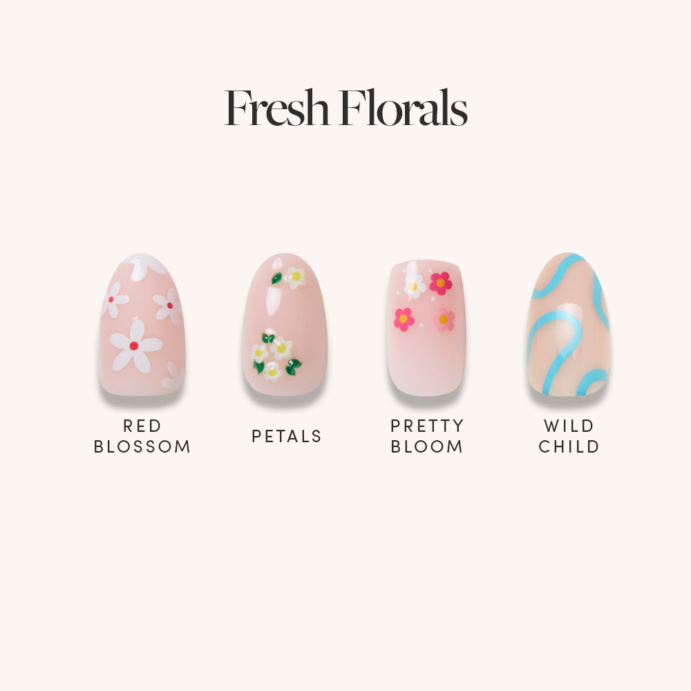 Four glamnetic Fresh Florals press-on nails shown on a light background: red blossom with white and red flowers, petals with green and white flowers, pretty bloom with pink and yellow flower accents, and wild child with blue swirls.