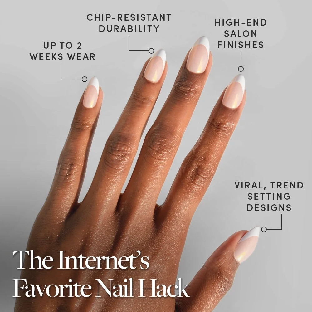 The Internet’s Favorite Nail Hack A hand showcases GIVE ’EM GRACE by glamnetic—short, almond-shaped press-on nails in a chic nude shade with refined white French tips. Enjoy up to 2 weeks of chip-resistant wear, high-end finishes, and trend-setting designs with these effortless press-ons. - Product image