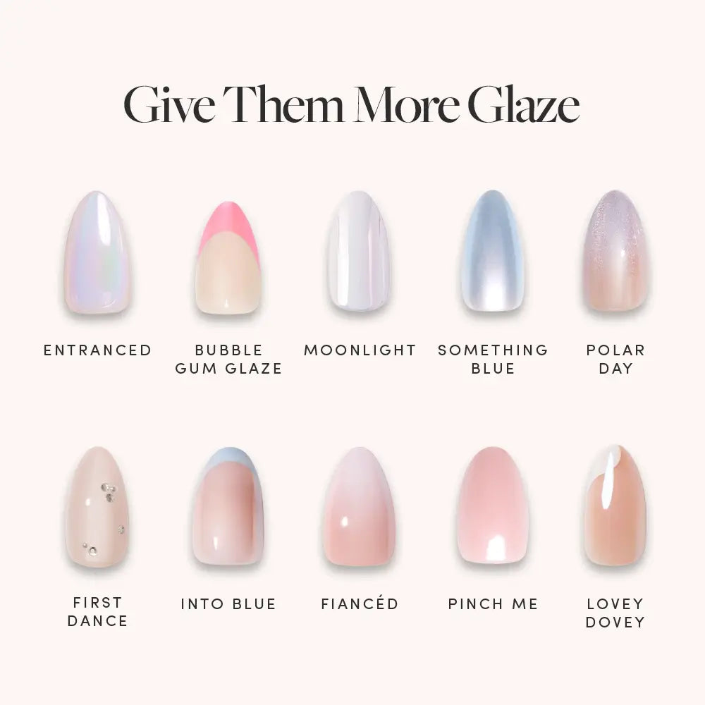 A display of ten glamnetic&#39;s Give Them More Glaze almond nail sets features pastel, chrome, and shimmer finishes—each with unique names like Entranced and Bubble Gum Glaze—for dazzling glazed nails.