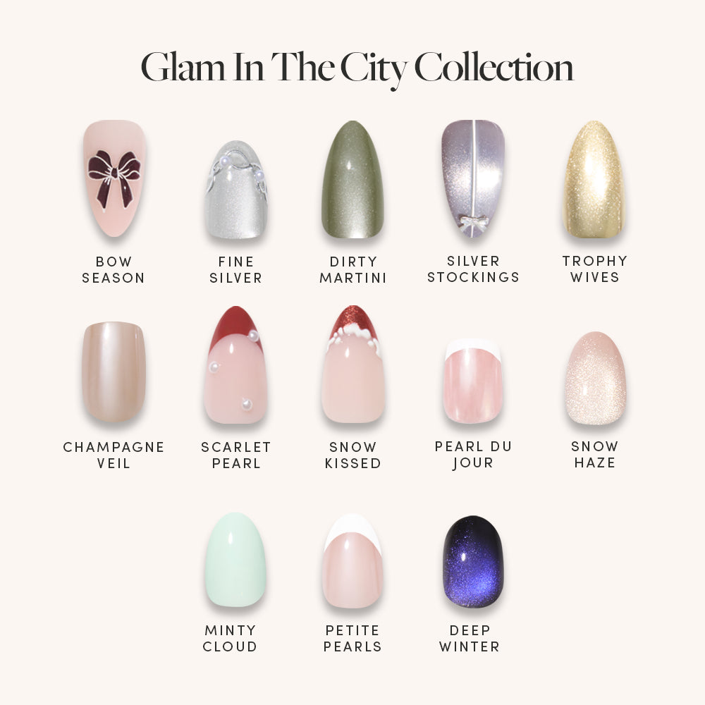Fourteen perfectly manicured nails showcase an array of polish shades—ranging from neutral nudes and shimmering silvers to bold green, mint, deep purple, and glittery gold press-ons—all labeled with their names under the Glam In The City Collection by glamnetic, offering salon-quality results in each premium nail set. - Product image