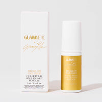 A white and gold bottle of Glamnetic x Glamzilla Brush-On Nail Glue is shown next to its matching rectangular box. The packaging features elegant gold lettering with the Glamzilla signature. The label notes the product size as 7 mL (0.24 fl. oz) and highlights that it includes a brush applicator for precise nail glue application.
