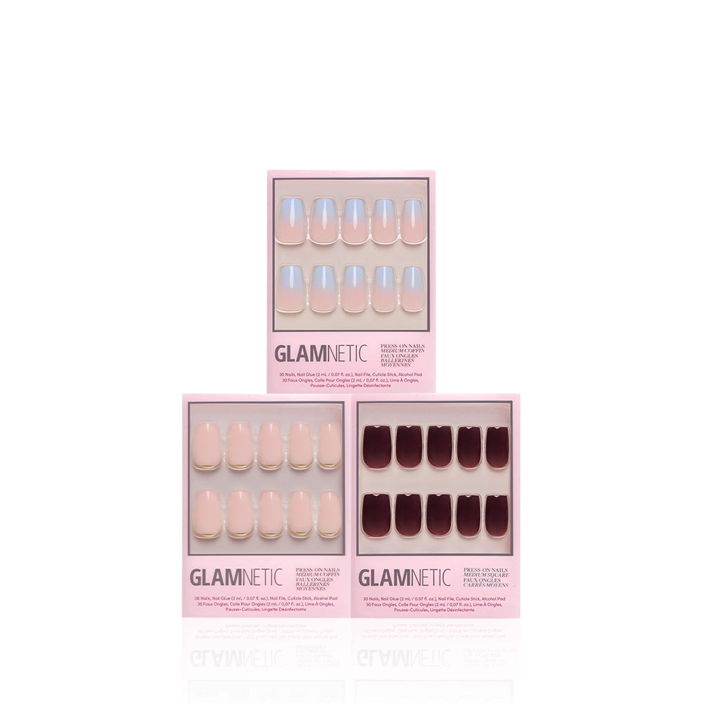 Three boxes of glamnetic Happy Mediums press-on nails in iridescent white, pale pink, and deep burgundy are displayed against a white background, highlighting salon-quality medium coffin nails in a chic set. - Product image