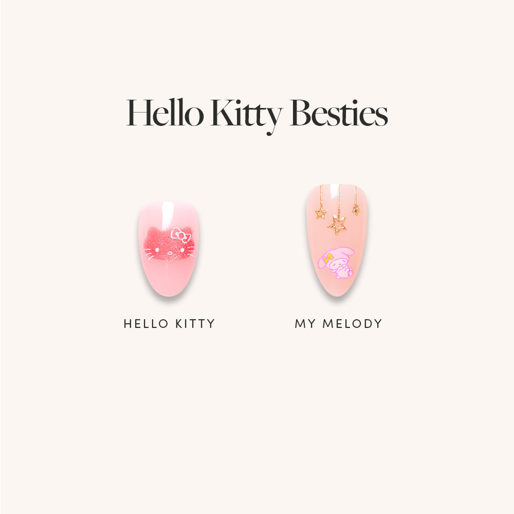 Glamnetic Hello Kitty® Besties press-on nails featuring a light pink design with Hello Kitty, My Melody, and dangling star charms.