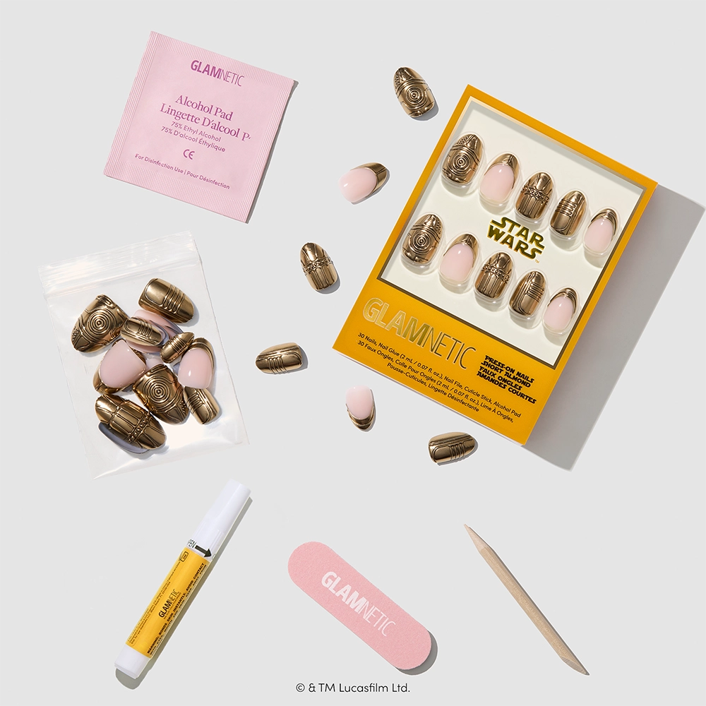 Help! I Think I’m Melting! - Glamnetic Help! I Think I’m Melting! press-on nails, glue, a nail file, a wooden cuticle stick, an alcohol pad, and extra nails are arranged on a white surface.