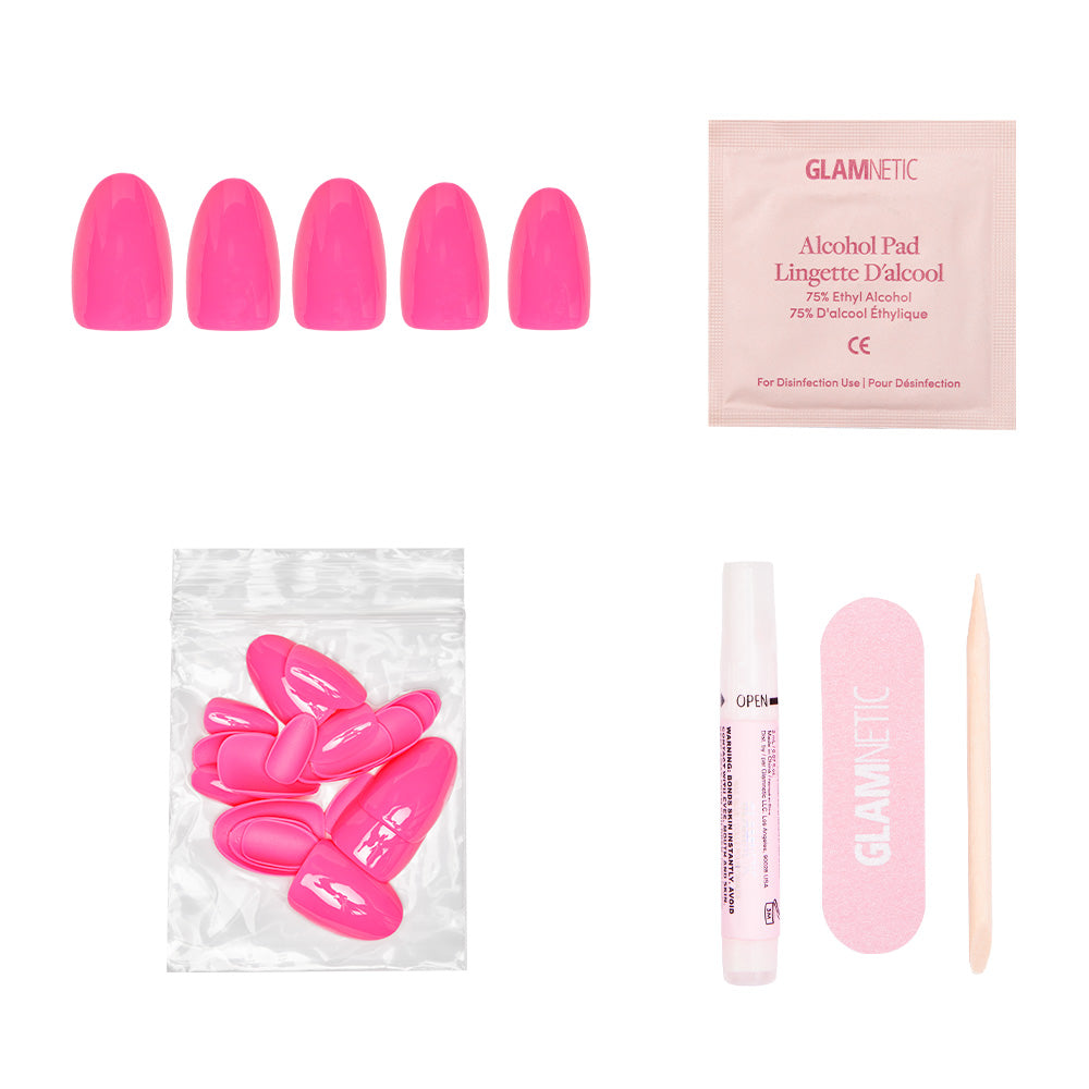The glamnetic Hot Pink press-on nail kit includes five short oval nails, an alcohol pad, extra nails, nail glue, a pink file, and a wooden cuticle stick for durable wear—all displayed on a white background. - Product image