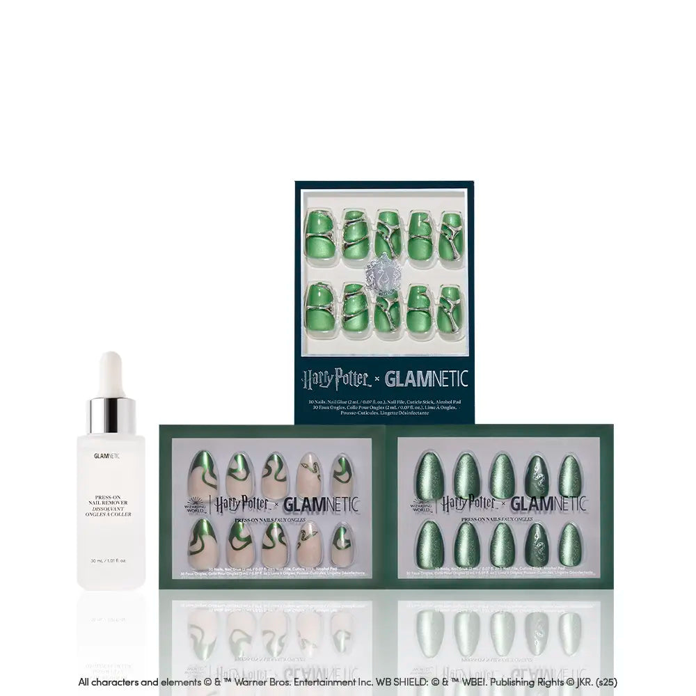 The glamnetic House Slytherin™ set includes two emerald green velvet nail sets, green press-on toenails, and a nail serum dropper bottle, all beautifully arranged on a white background. - Product image