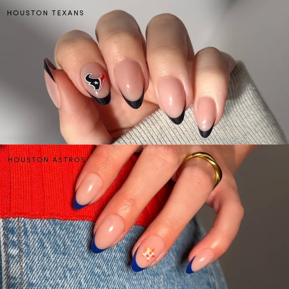 Two hands display manicured nails using glamnetic’s Houston All-Stars sets: the top hand shows nude nails with black tips and a Houston Texans press-on accent, while the bottom hand has nude nails with blue tips and a Houston Astros press-on accent. Both sport long sleeves, highlighting these officially licensed glamnetic nail sets—the perfect choice for any sports fan.