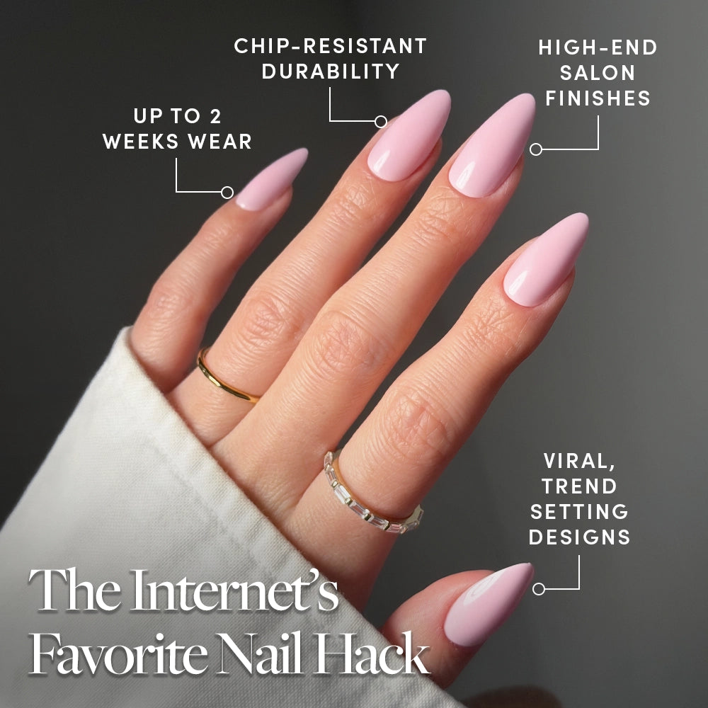 A hand with long, glossy Iconic Pink almond-shaped press-on nails by glamnetic is shown, highlighting chip-resistant durability, up to 2 weeks wear, salon-quality finish, and trendy design. Text reads: The Internet’s Favorite Nail Hack. - Product image