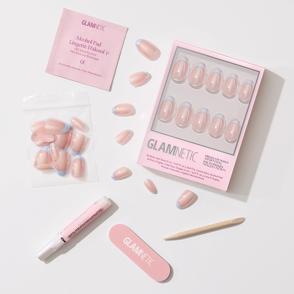 Into Blue by glamnetic: salon-quality press-on nails with pink and periwinkle micro French tips. Set includes nail file, cuticle stick, nail glue, alcohol pad & extra nails—all shown on a white background. - Product image