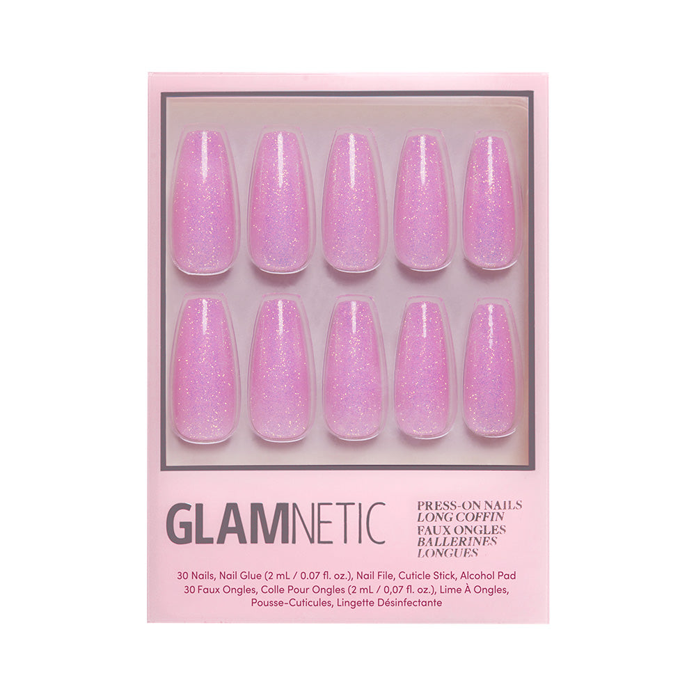 A box of glamnetic Juicy long coffin nails in shimmery pink with Y2K vibes, featuring 10 nails in two rows and assorted nail care tools shown on the package.
