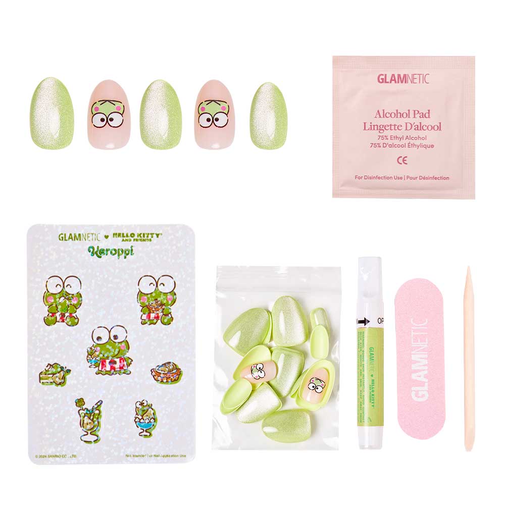 The glamnetic Keroppi™ Nail Set includes green and pink frog-themed reusable nails, a pink nail file, wooden cuticle stick, alcohol pad, adhesive, and a sheet of cute Keroppi character stickers for extra Sanrio charm. - Product image