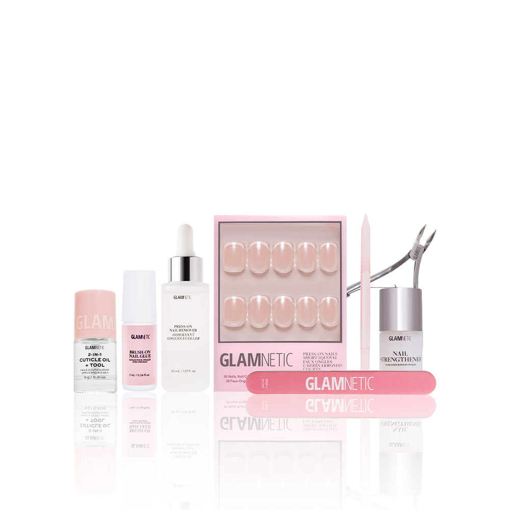 The glamnetic La Perle Manicure Masterpiece Bundle features press-on nails, cuticle oil, nail serum, strengthening polish, a pink nail file, cuticle pusher, and nipper—essential nailcare tools displayed on a white background. - Product image