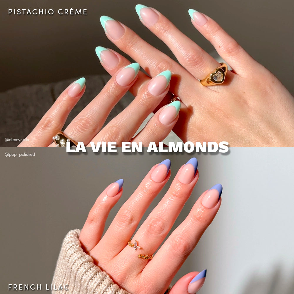 Two hands show glamnetics La Vie en Almonds press-ons: one with pastel mint, the other lilac, both with short almond French tips and gold rings. Style names appear above each image. LA VIE EN ALMONDS is written across.