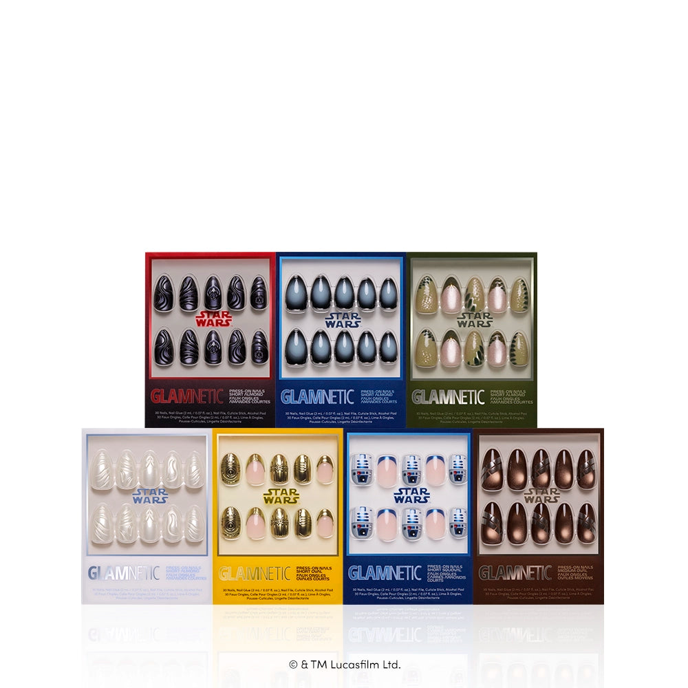 Legends of the Galaxy - Seven Legends of the Galaxy artificial nail sets by glamnetic are arranged in two rows, each set showcasing unique colors and Star Wars character-inspired nail art. This collector’s bundle is perfect for fans eager to express their love for STAR WARS with bold, standout press-on nails.