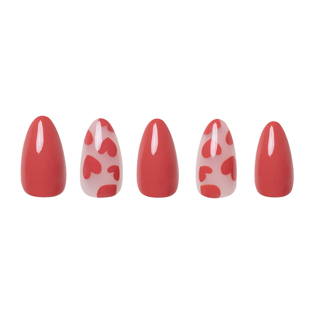 The Love Me almond nails by glamnetic feature three glossy solid red nails and two with clear bases adorned with red heart accents, creating a playful and romantic look. - Product image