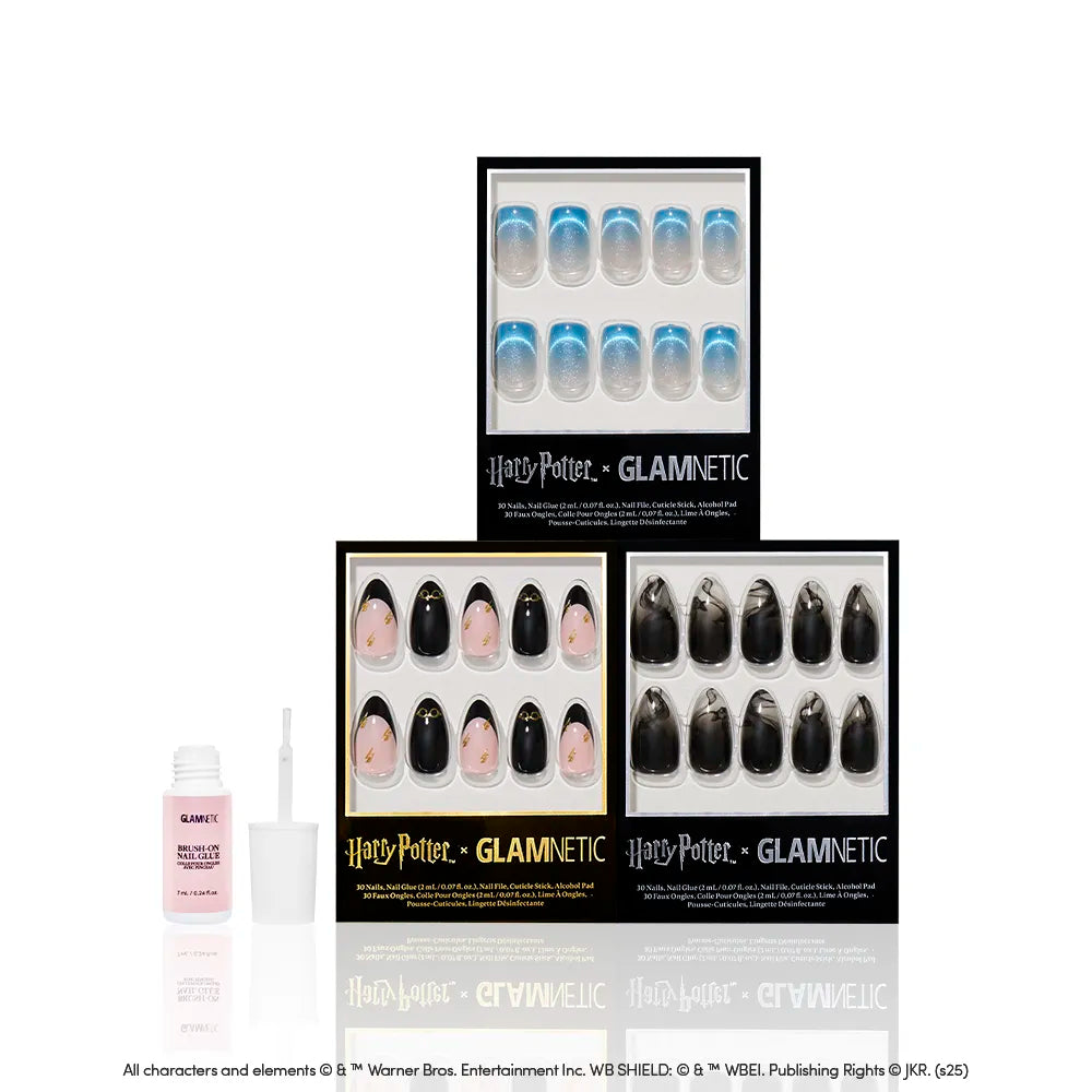 Four sets of glamnetic Marked By Magic almond press-on nails, each with unique designs and colors, are displayed alongside a bottle of glamnetic nail glue. The glossy nails pop beautifully against the white background. - Product image