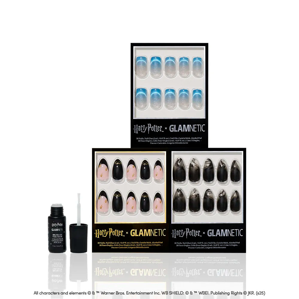 Four sets of glossy glamnetic "Marked By Magic" Harry Potter almond press-on nails—blue ombre, black with crescent moons, black lightning bolts, nude/black with gold accents—plus a bottle of nail glue. - Product image
