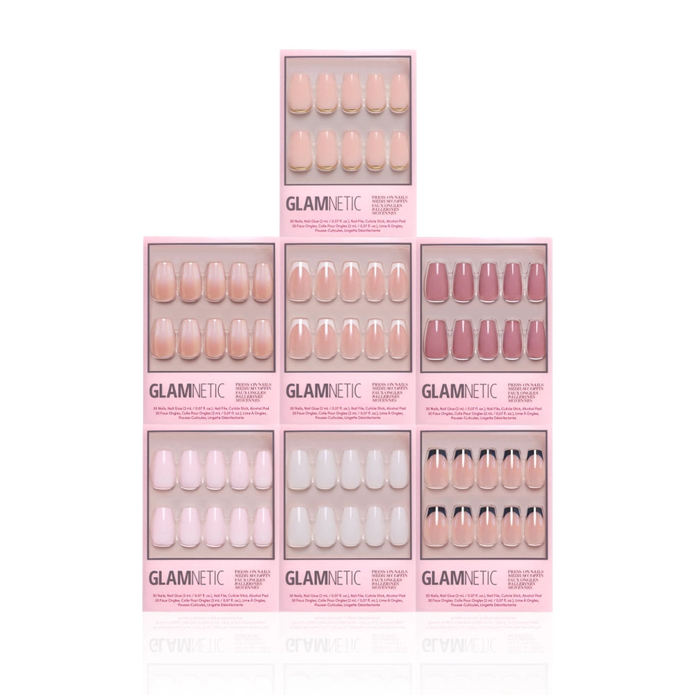 Six boxes of glamnetic Medium Coffin Icons press-on nails in pink and nude shades are pyramid-stacked on a white background. Each box shows 24 nails with minimalist designs and modern French tips. - Product image
