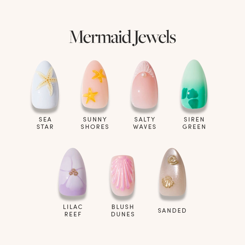 Mermaid Jewels by glamnetic features 7 press-on nails with mermaid-inspired designs—Sea Star, Sunny Shores, Salty Waves, Siren Green, Lilac Reef, Blush Dunes, and Sanded—decorated with oceanic accents and shimmering colors.