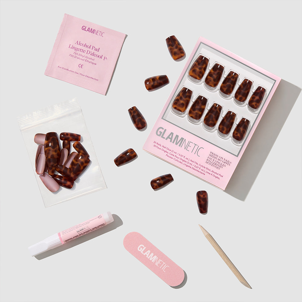 The Mine By Right press-on nails by glamnetic feature a medium coffin tortoiseshell design and come with a pink nail file, wooden cuticle stick, nail glue, alcohol pad, and extra nails for a salon-quality mani at home. - Product image