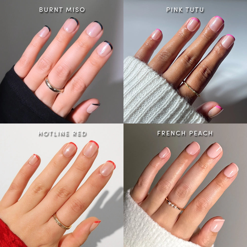 Four hands with manicured nails showcase the glamnetic Mini French Study Sesh collection: top left features black-tipped micro French tips in Burnt Miso, top right has soft pink tips in Pink Tutu, bottom left displays red tips in Hotline Red, and bottom right shows nude nails in French Peach. Each hand is adorned with rings, and all nails are styled with short press-on sets for a chic, effortless look.