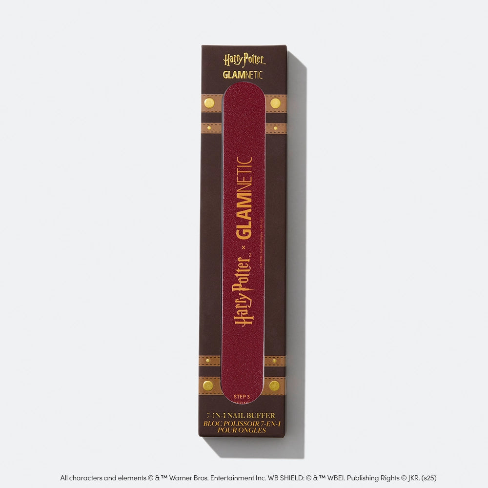 The Harry Potter™ x Glamnetic 7-in-1 Nail Buffer comes in maroon packaging with gold accents, displaying both brands’ logos and reads “Step 1: Nail Buffer” for salon-perfect nails.