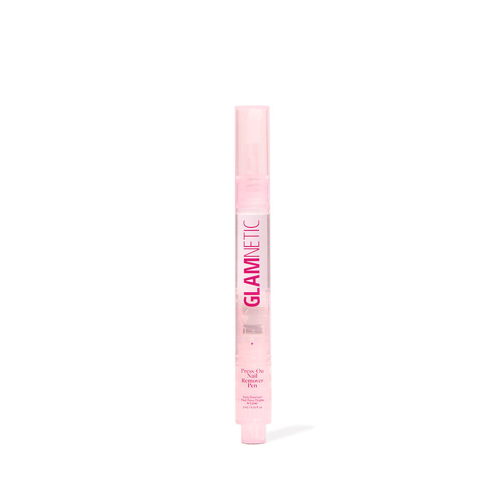 A pink Glamnetic Press-On Nail Remover Pen with a clear cap and text printed on the barrel.