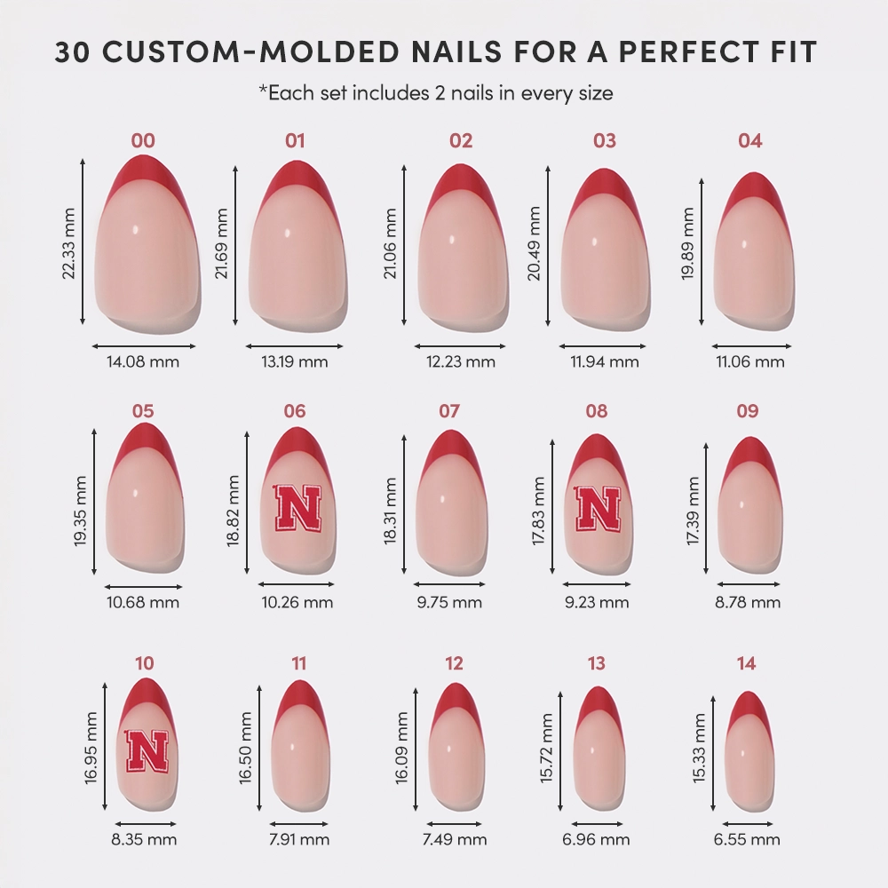 The glamnetic Nebraska Cornhuskers Press-On Nail Set chart shows 15 custom-molded sizes, each with red tips or the Nebraska “N” logo, labeled by size number with detailed width and length in millimeters. - Product image