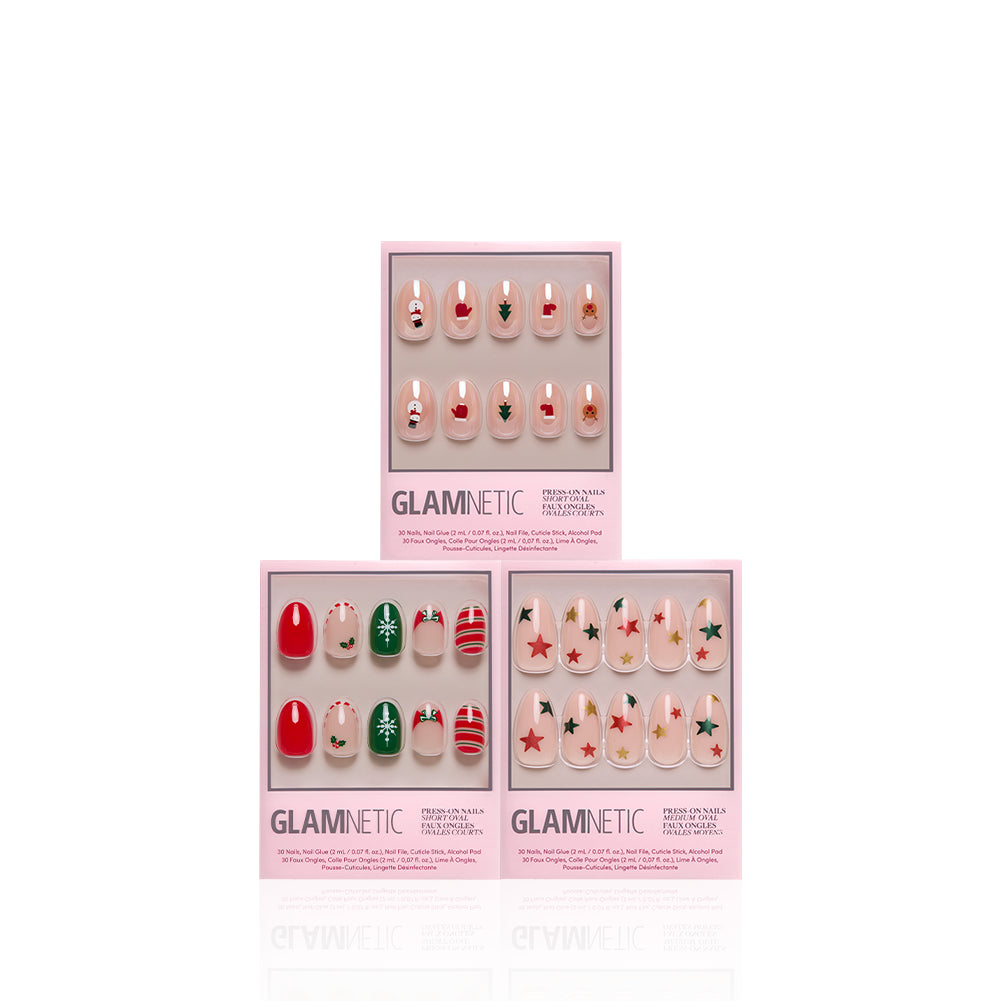 Oval the Holiday - Glamnetic Oval the Holiday press-on nails featuring three sets with candy cane stripes, gingerbread men, and solid red and white designs in a salon-quality finish.