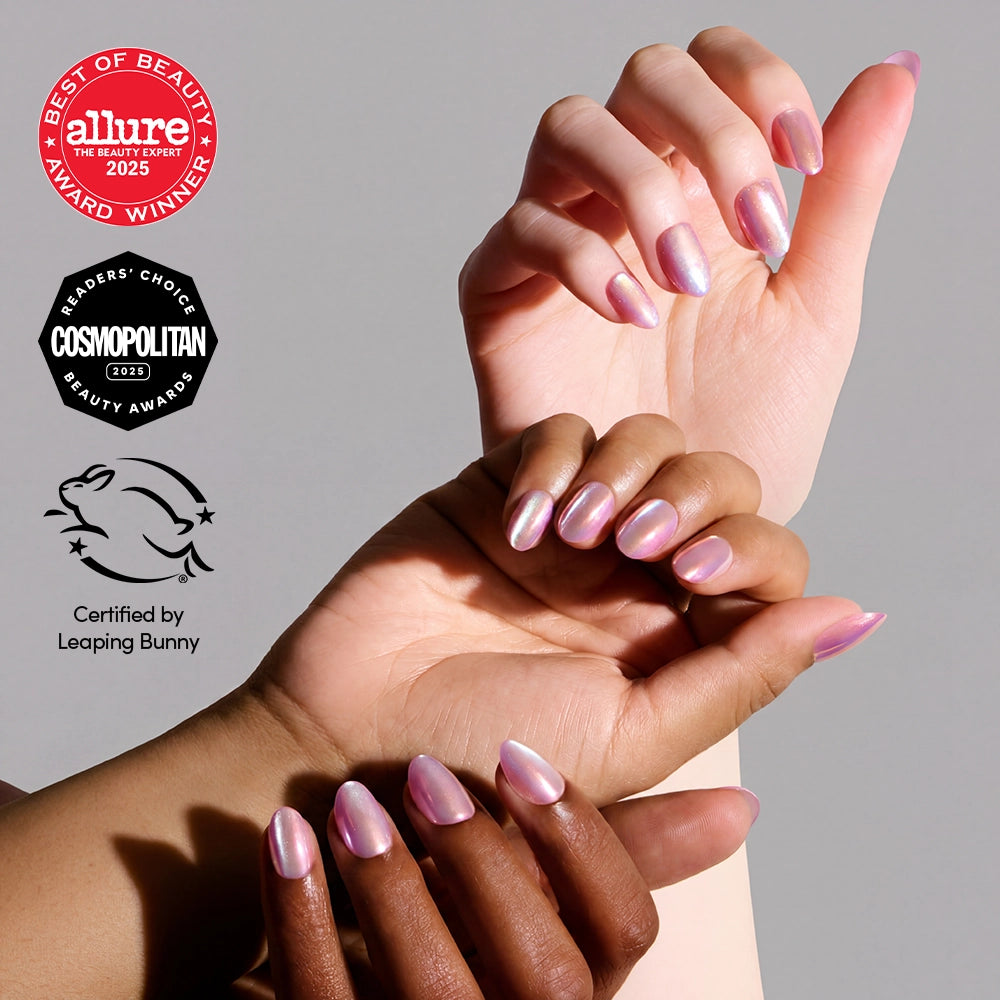 Two hands with short oval nails, painted in glamnetic’s Oyster (iridescent pink), appear against a light background. Award logos from Allure, Cosmopolitan, and the Leaping Bunny certification are shown on the left.