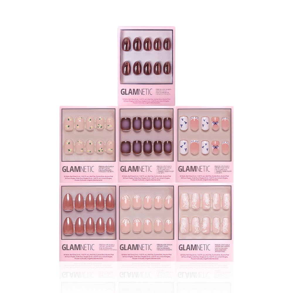 Eight glamnetic Rodeo Darling nail sets are arranged in a pyramid, each offering salon-quality designs—solid colors, florals, and abstracts—in pinks, mauves, and nudes. Perfect for creating festival-ready nails at home. - Product image