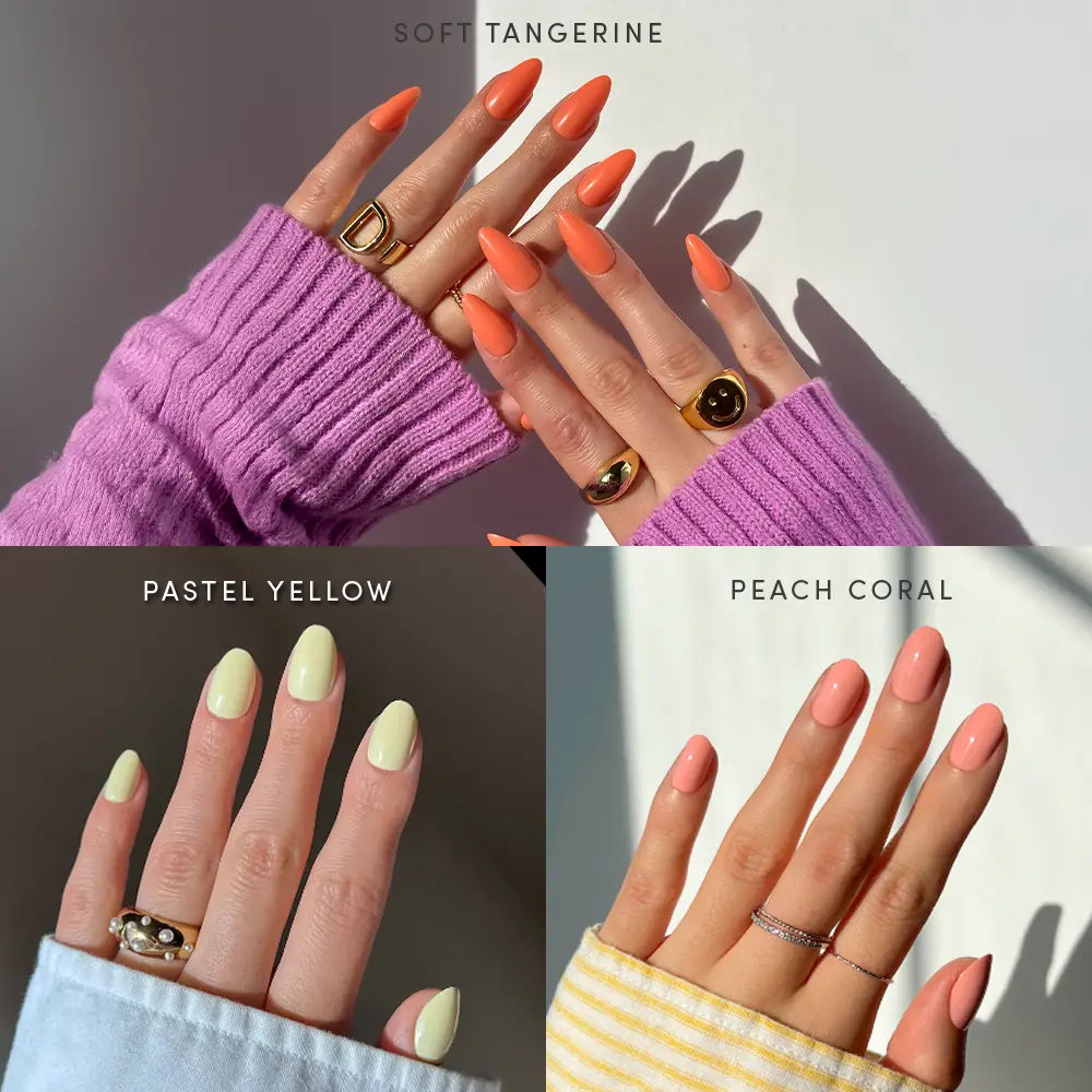Three hands with manicured nails display glamnetic’s Pastel Paradise salon-quality press-on nail bundle: the top hand features Soft Tangerine in bright orange, the bottom left shows Pastel Yellow, and the bottom right wears Peach Coral. Each look is accented with stylish rings and colorful sleeves, highlighting this pastel set.