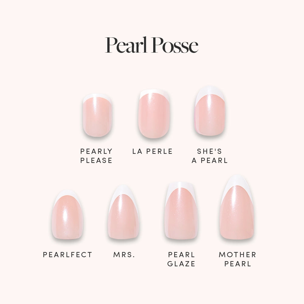 The glamnetic Pearl Posse Bundle features seven soft pink artificial nails with glazed French tips, displayed in two rows and labeled with names such as Pearly Please, La Perle, and She’s a Pearl.